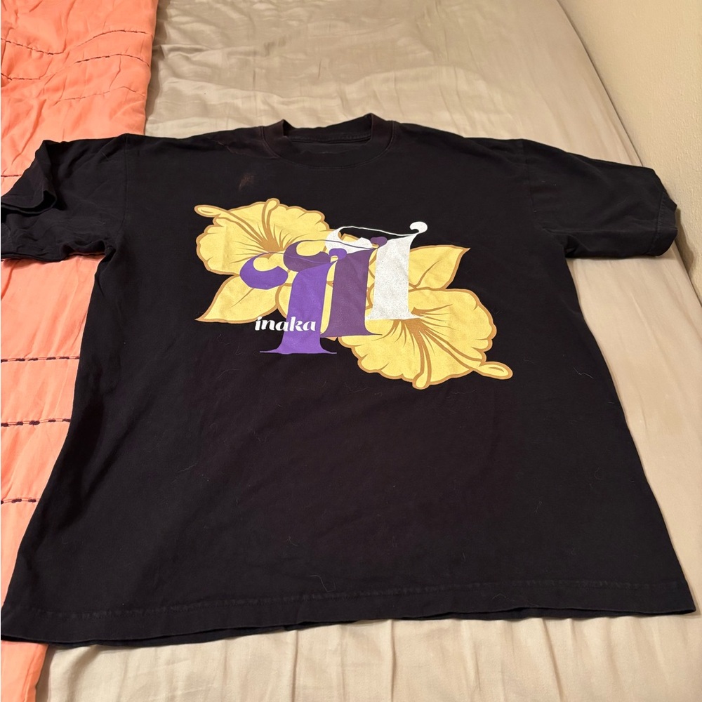 Unisex Black Graphic T-Shirt with Yellow and Purple Design